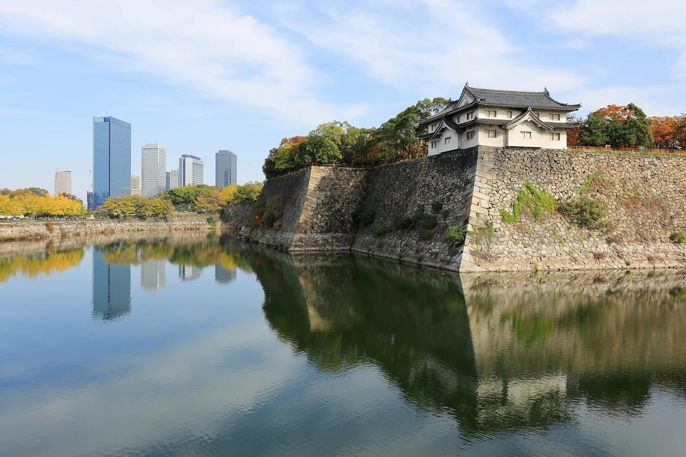 Osaka Castle moat with Osaka Business Park skyline