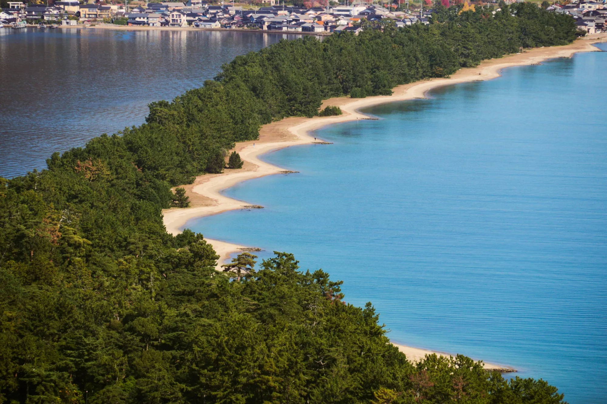 Pine-covered Amanohashidate sandbar between Miyazu Bay and the Aso Sea