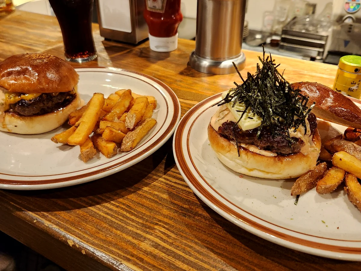 Two burgers and fries at HYOE'S BURGERS in Kobe