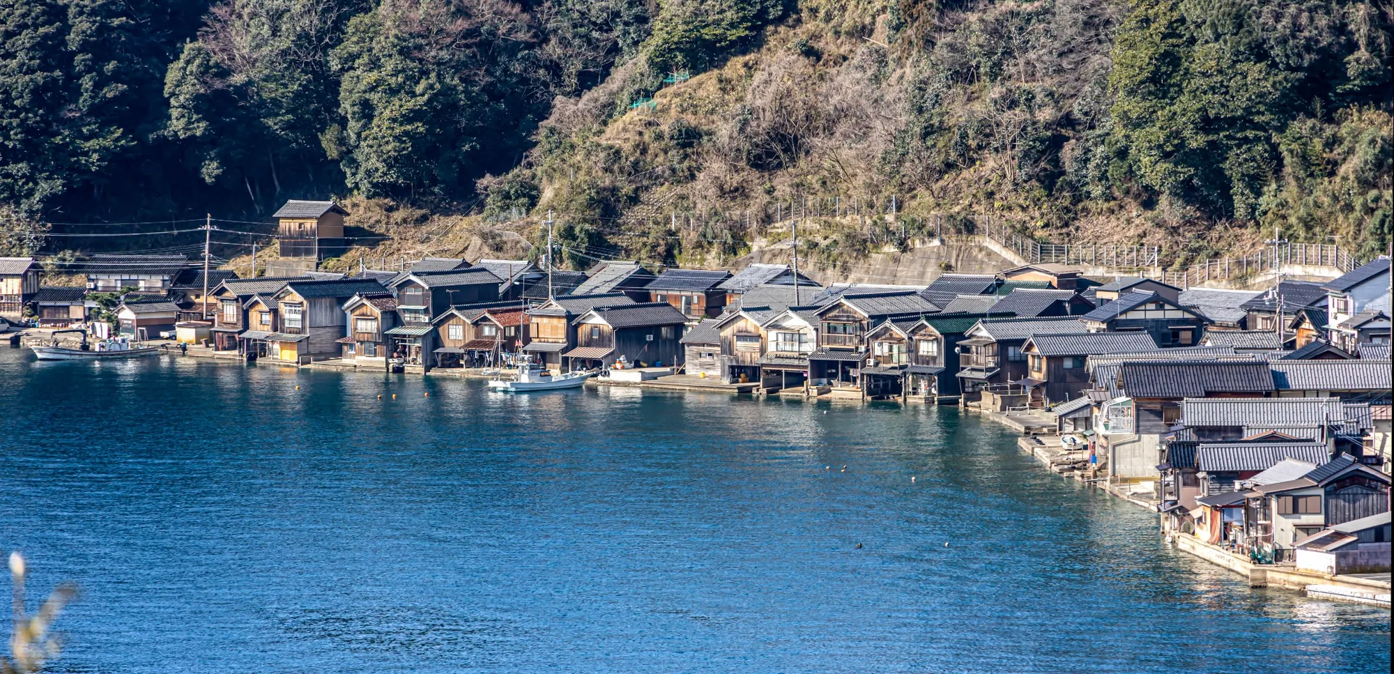 Traditional funaya boathouses lining Ine Bay in Kyoto