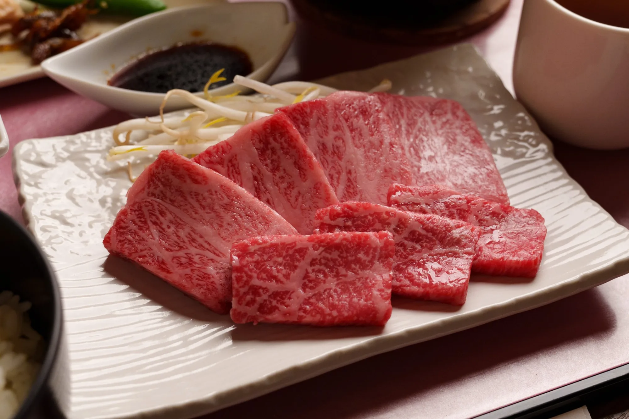 Marbled slices of Omi beef served in Shiga