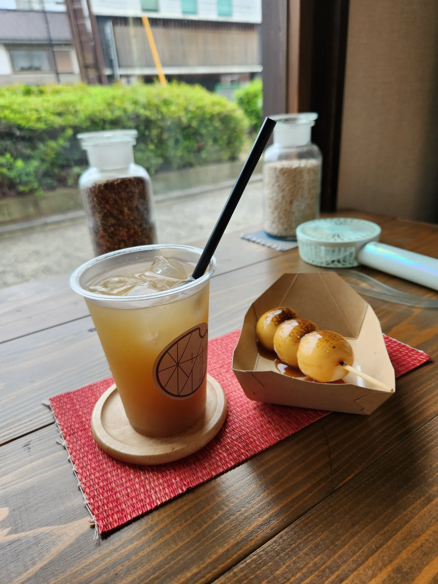 Mitarashi dango and a drink at Tabi no Kusuribako in Kurashiki