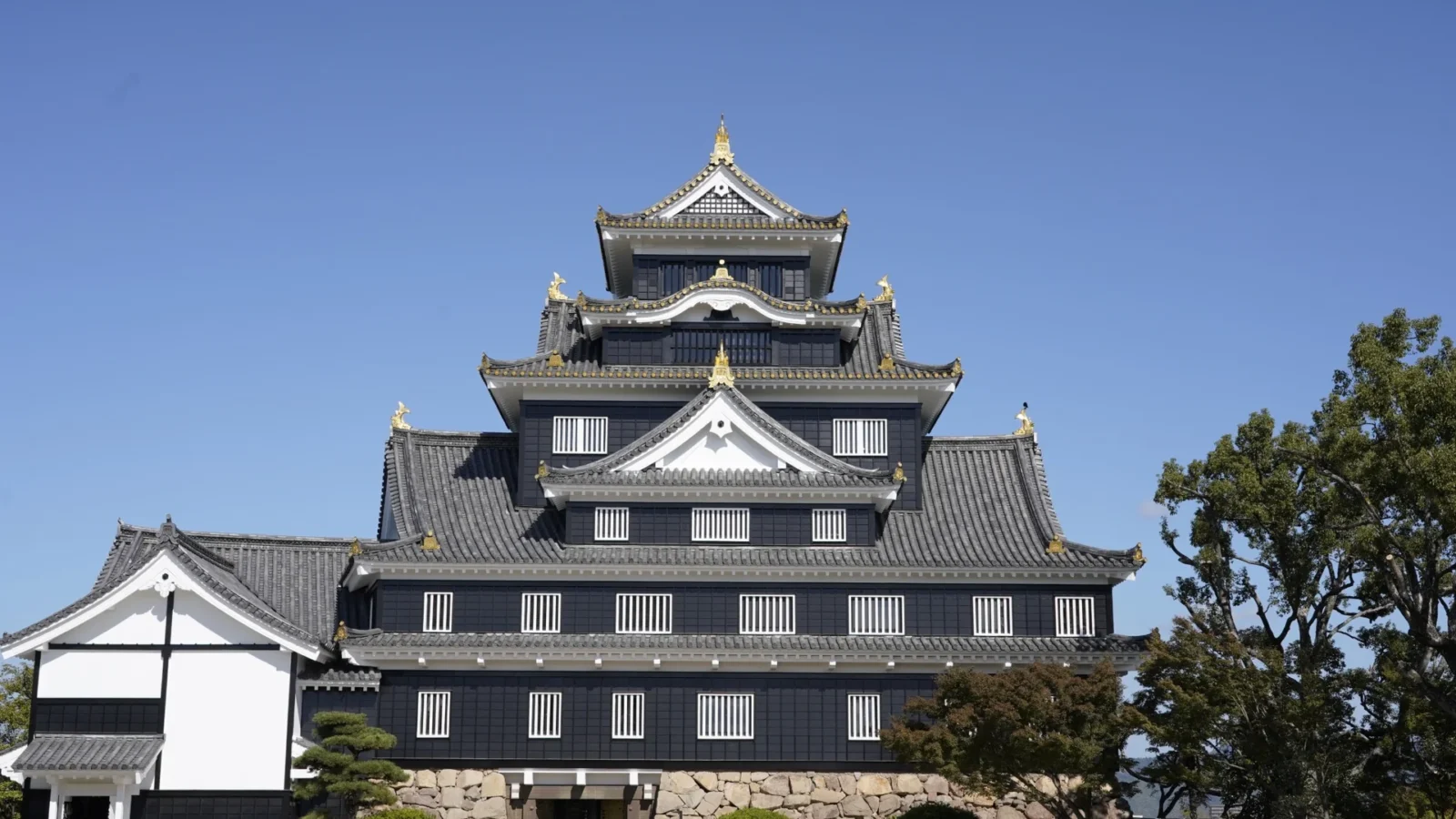 Okayama Castle with its distinctive black exterior in Okayama, Japan